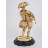 A JAPANESE SECTIONAL CARVED IVORY FIGURE the fisherman standing with a crab on his arm and with a