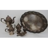 AN INDONESIAN (DJAKARTA) SILVER TEA SERVICE comprising; teapot,22cm high, hot water pot, 16.5cm