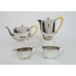 AN ART DECO SILVER FOUR PIECE TEA SERVICE by Stower & Wragg Ltd. Sheffield 1935 of rounded