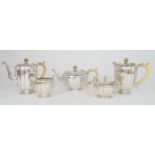 A FIVE PIECE SILVER TEA & COFFEE SERVICE by the Goldsmiths & Silversmiths Co. Ltd, London 1939 of