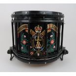 A SNARE DRUM BY REMO hand painted with a crest & " Queen Victoria School " 40 cm. dia x 32 cm high