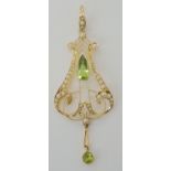 A 15CT GOLD EDWARDIAN PERIDOT AND PEARL PENDANT dimensions 6.6cm x 2.5cm, weight 4.7gms Condition