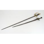 AN ANTIQUE SHORT SWORD/ FLINTLOCK PISTOL missing hilt cover & some of the mechanism 69 cm o/all