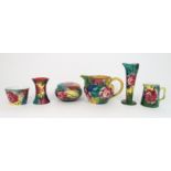 A COLLECTION OF JAZZY WEMYSS PIECES painted with roses, including a milk jug and sugar bowl, a pot