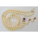 *WITHDRAWN* A DOUBLE ROW PEARL CHOKER with decorative 9ct pearl and amethyst clasp dimensions