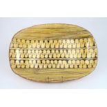 A CONTEMPORARY BRITISH SLIPWARE DISH of oval shape, 48cm long Condition Report: Available upon