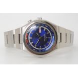 A STAINLESS STEEL SEIKO BELL-MATIC WRISTWATCH with a metallic blue dial with red chapter ring