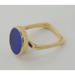 AN 18K CARTIER DINH VAN LAPIS LAZULI RING circa 1960, with square shaped ring shank the lapis is
