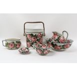 A WEMYSS WASH SET comprising washbowl, ewer, pail, soap dish, sponge dish and chamber pot, all