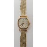 A 9CT and 14K GOLD LADIES RECORD DE LUXE with squared silvered dial, gold coloured baton numerals
