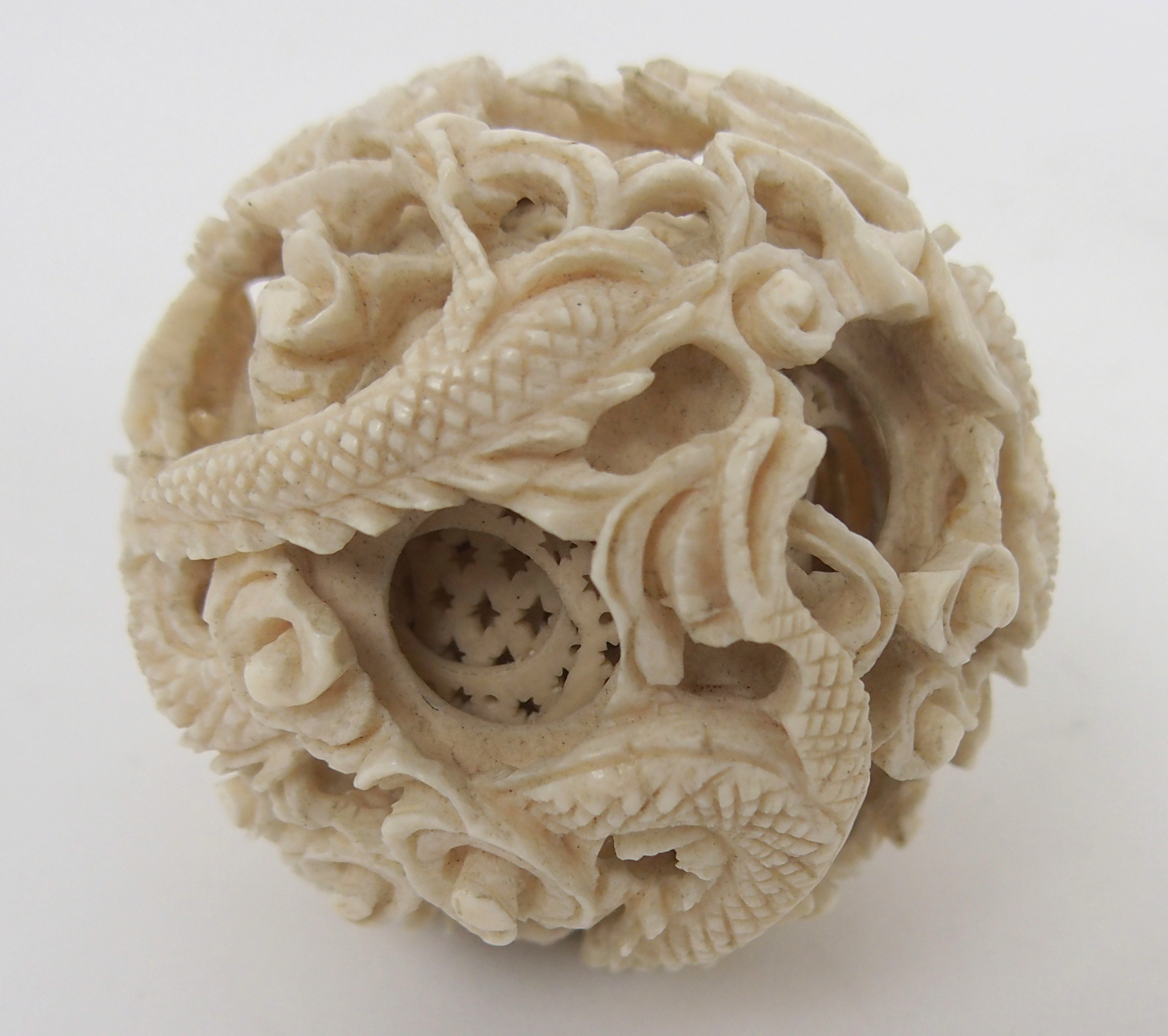 A CHINESE IVORY CONCENTRIC BALL AND A STAND 21.5cm high, a ball carved with foliage, 12cm - Image 9 of 10