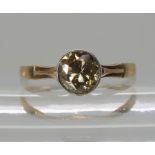 A POLISH CHAMPAGNE DIAMOND RING stamped with Polish hallmarks for 14k gold. The ring with pretty