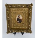 A BERLIN PORCELAIN OVAL PLAQUE with three quarter length portrait of Ruth carrying sheaves of