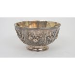 A CHINESE EXPORT SILVER BOWL decorated with irises on a hammered ground, inscription to the foot