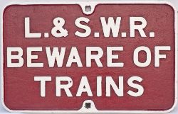 London & South Western Railway cast iron sign L&SWR BEWARE OF TRAINS. In restored condition with
