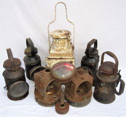 A collection of lamp spares and handlamps all requiring restoration to include a GWR Handlamp