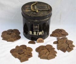 A Lot containing a BR(W) Pay Check Tin complete with approximately 94 x BR(W) copper pay checks