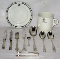 A Lot containing a collection of railway dining ware to include a GWR side plate. GWR Hotels Mug and