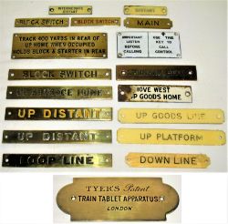 A lot containing a collection of both brass and ivorine signal box shelf plates together with a