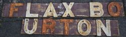 GWR Wooden running in board with cast iron letters. FLAXBOURTON in two pieces. Original recovered