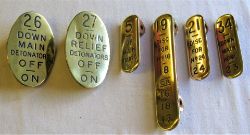 A lot containing a collection of GWR brass lever leads to include oval 26 DOWN MAIN DETONATORS. Oval