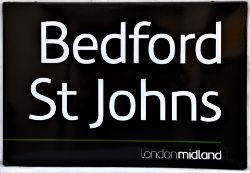 London Midland fully flanged black & white station sign. BEDFORD ST JOHNS. In excellent condition