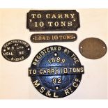 A collection of cast iron Wagon Plates which appear to be recovered from the same vehicle. TO