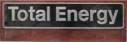 Nameplate TOTAL ENERGY - Uncarried and mounted on wooden back board. The original nameplate was