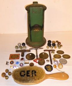 A lot containing a small collection of railway buttons, pay checks and other items including an