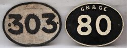 2 Cast Iron oval bridge plates. GNR 303 in original condition and GN&GE 80 in re painted condition.