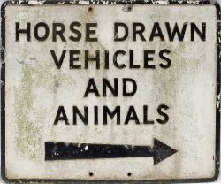 Road sign HORSE DRAWN VEHICLES AND ANIMALS measuring 24.5in x 20.25in. Cast aluminium in as