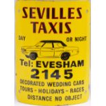 Advertising enamel sign SEVILLES TAXIS EVESHAM 2145 with image of a Vauxhall Victor. In excellent