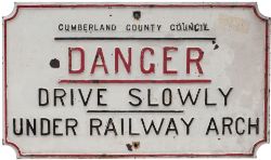 Road sign CUMBERLAND COUNTY COUNCIL DANGER DRIVE SLOWLY UNDER RAILWAY ARCH. Rectangular cast iron in