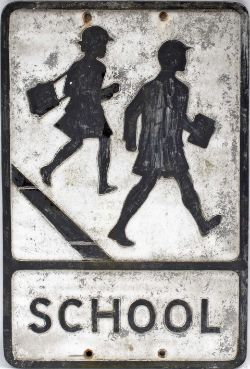 Road sign SCHOOL with the two children pictogram. Cast aluminium in as removed condition. Measures