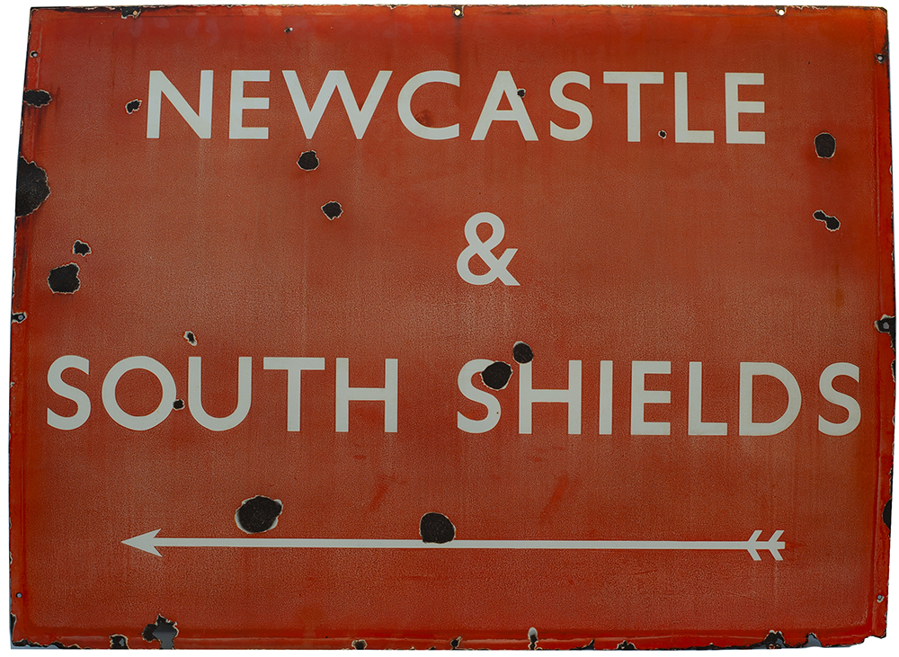 BR(NE) enamel railway sign NEWCASTLE & SOUTH SHIELDS with left facing arrow. In good condition