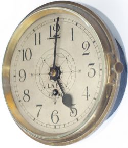 LNER Pullman clock No 11395. With an 8 day English lever movement, 7.5in silvered dial with wax