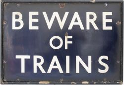 LNER enamel sign BEWARE OF TRAINS. In very good condition mounted in a wooden frame. Enamel measures