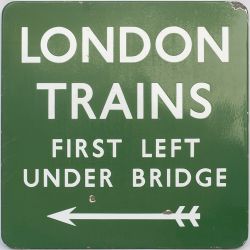 BR(S) FF enamel railway sign LONDON TRAINS FIRST LEFT UNDER BRIDGE with left facing arrow. In very