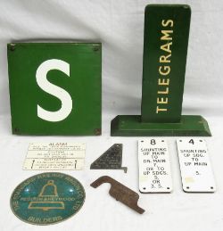 A lot containing odd signalling items and plates. Enamel S mounted onto wood. 2 x lever plates.