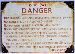 BR(W) Enamel sign. DANGER. THIS BUILDING CONTAINS HIGHLY INFLAMMABLE STORES. Measures 14 x 10 in.