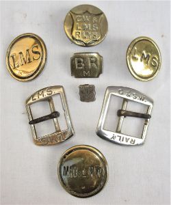 A lot containing a collection of Railway Horse Brasses and belt buckles. LMS. GW & LMS MID & LNW. G&