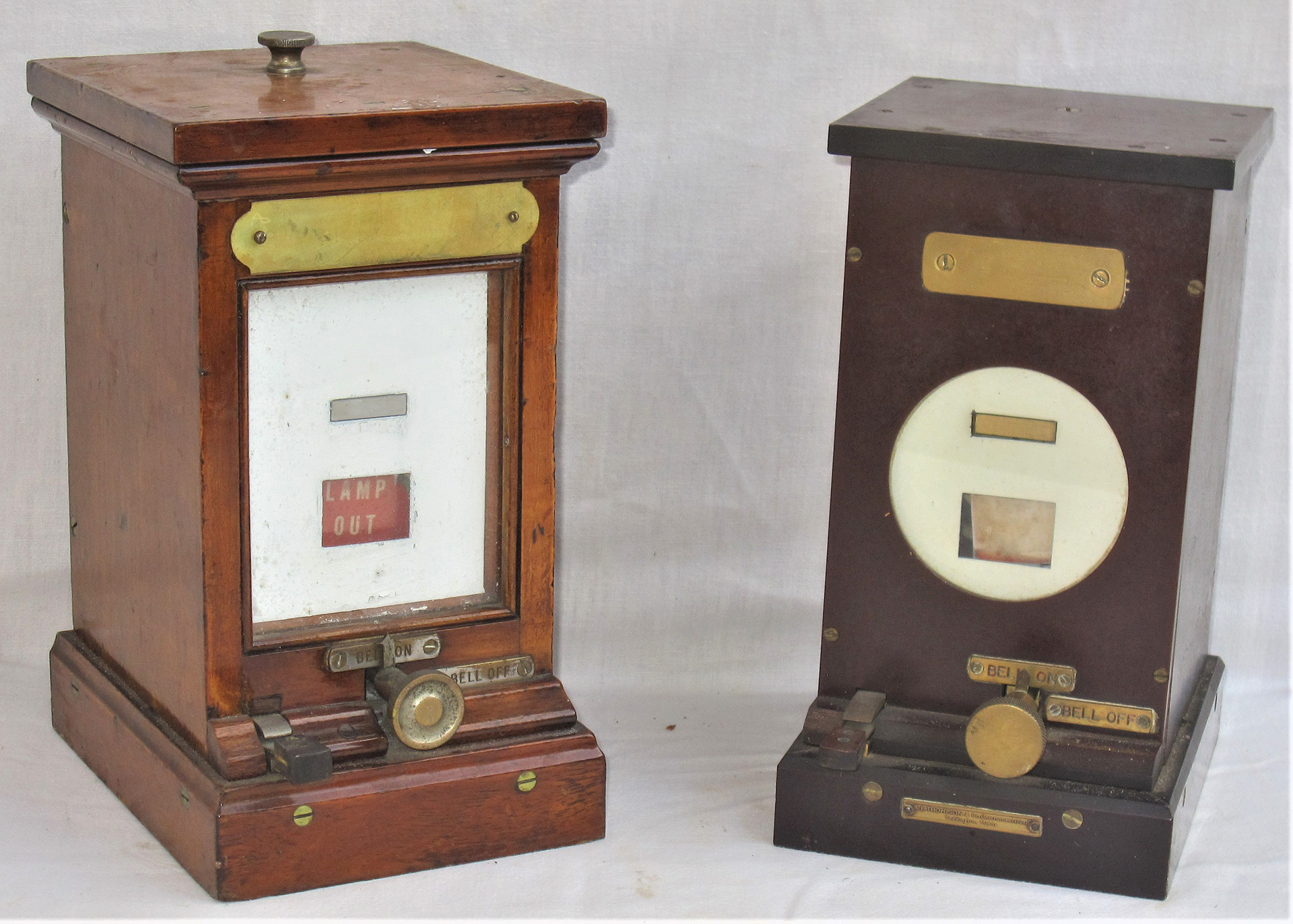 A pair of GWR Lamp Indicators. Wooden cased example showing Lamp - in/out together with a RE