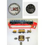 A lot containing miscellaneous items of interest. LMS enamel Badge. GWR Type Writer Tin. GWR Pay