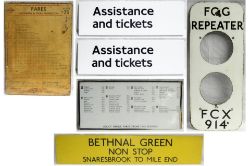 A lot containing London Transport Items to include . BETHANAL GREEN Sign. 1948 Wooden Bus Fare