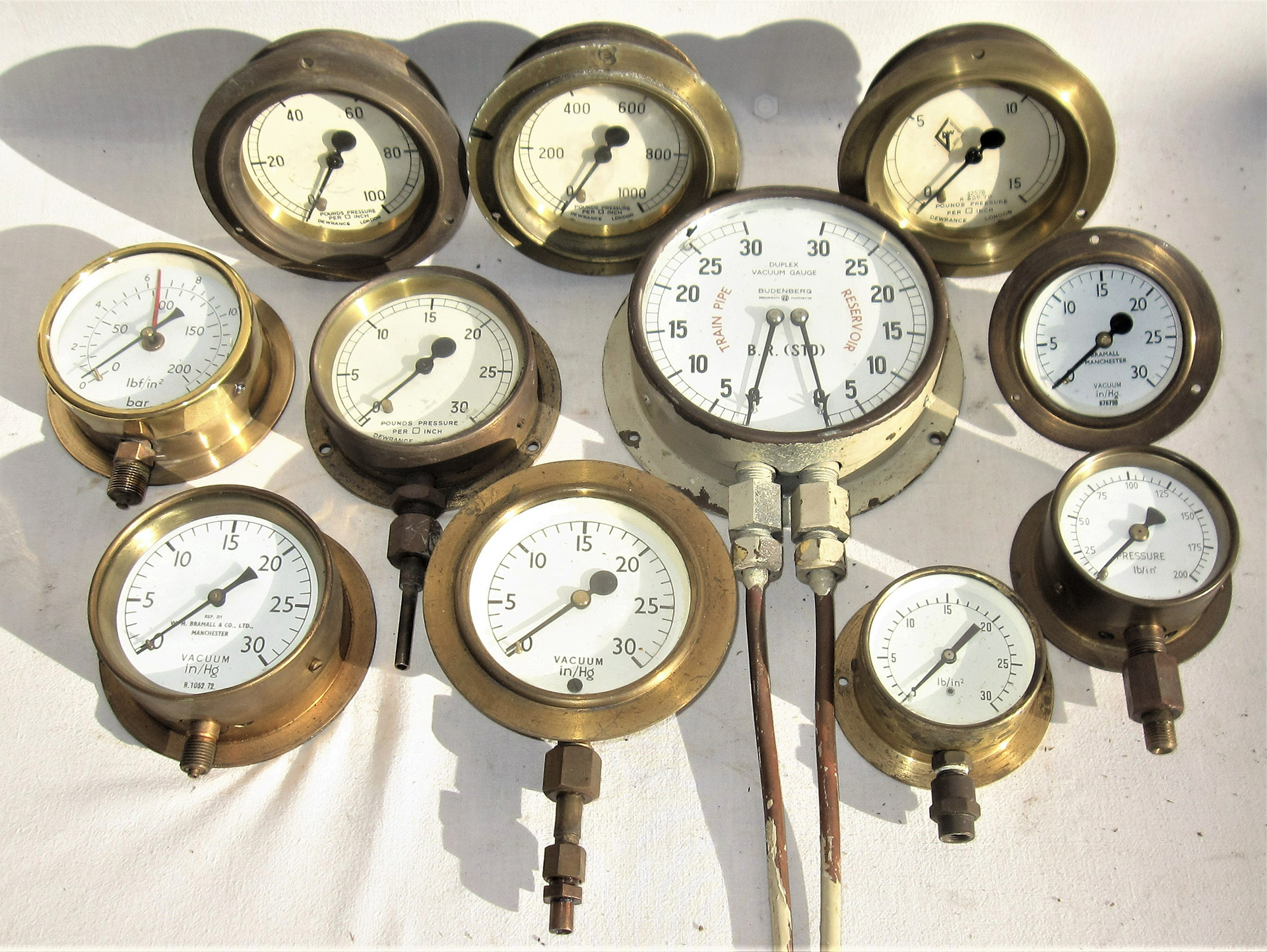 A Lot containing a collection of 11 x Diesel Loco Brass Pressure Gauges. Ideal spares for