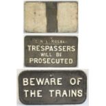 A pair of Cast Iron signs. LNE Railway TRESPASSERS (GER Pattern) measuring 20.75 x 12 In together