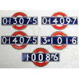 A lot containing a collection of 5 x enamel London Transport Underground carriage number plates as