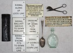 A Lot containing various railway items to include a GCR Glass Bottle. White Enamel Sign Notice to