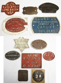 A lot containing 12 x Cast Iron Wagon Plates. Star Plate LMS 83158 JLY 1936 (Damaged). LNER D