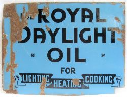 Enamel Advertising Sign. ROYAL DAYLIGHT OIL FOR LIGHTING HEATING and COOKING. Some loss to enamel